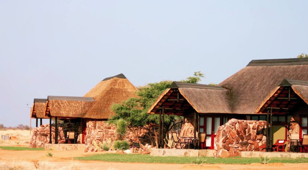 Thatched chalets at the Namibia plains game concession